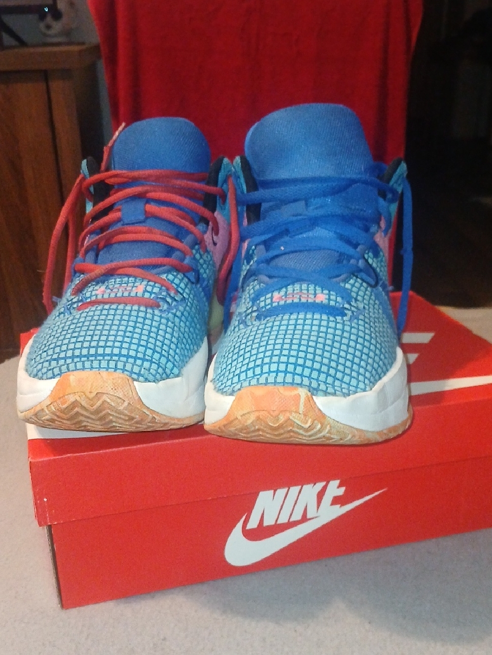 Lebron James: Nike Blue Sneakers with Orange Accents
